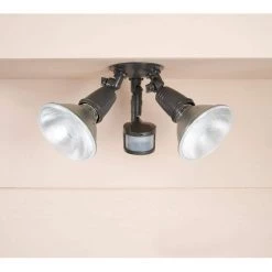 180-Degree Bronze Twin Head Motion Activated Outdoor Flood Light by Halo -Halo Shop bronze halo flood lights ms185 40 1000